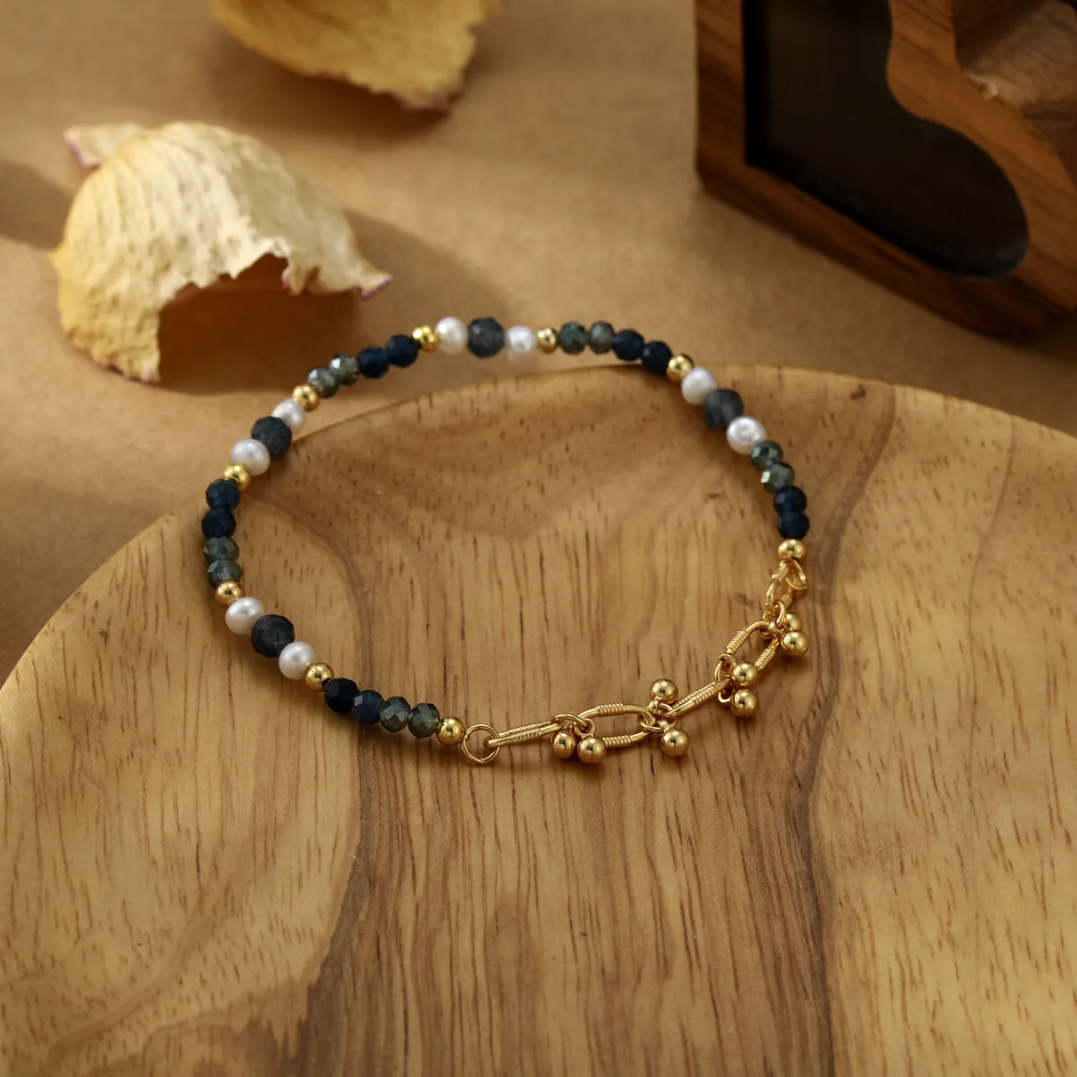 Cross Charm Blue Bead Bracelet — view 1