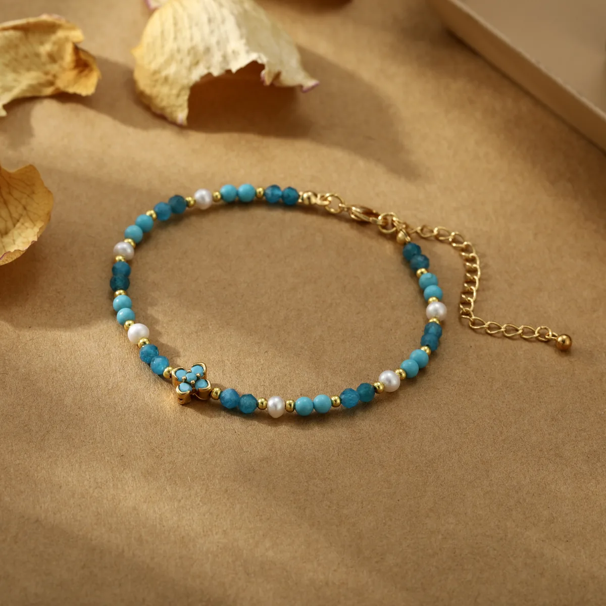 Butterfly Charm Blue Bead Bracelet — view 1