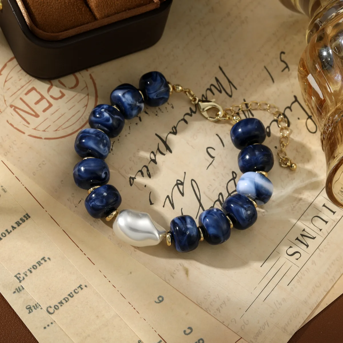 Irregular White Accent Navy Bead Bracelet — view 1