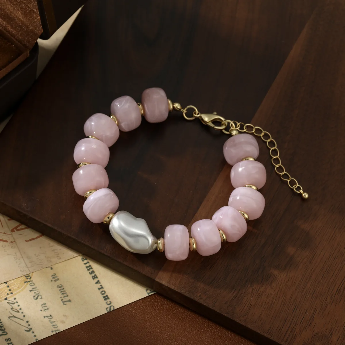 Irregular White Accent Pink Bead Bracelet — view 1