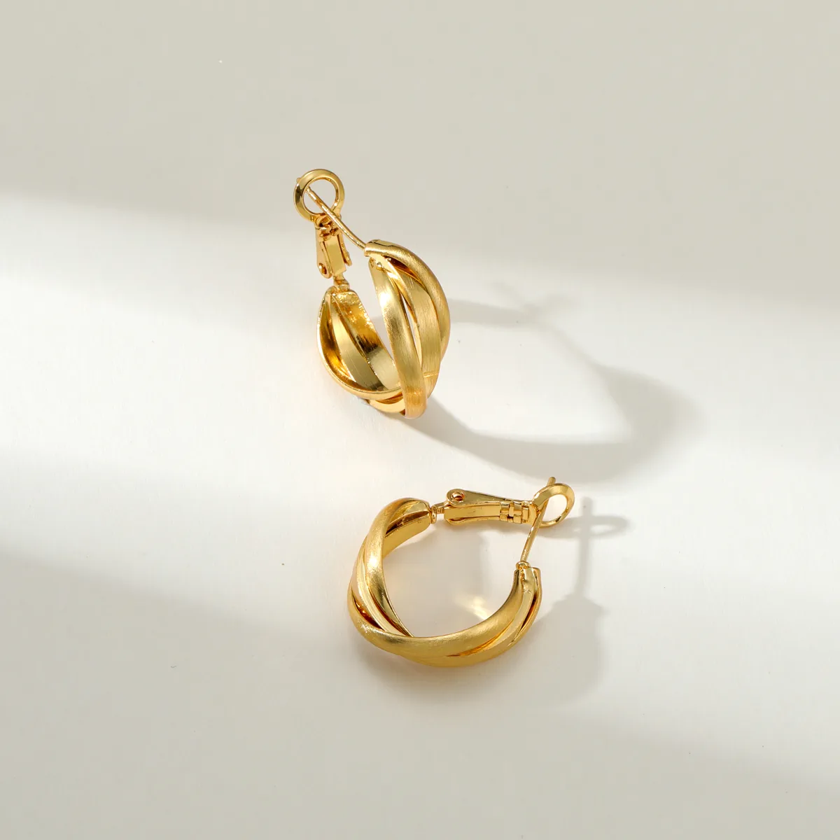 Twisted Mini Hoop Earrings — view 1