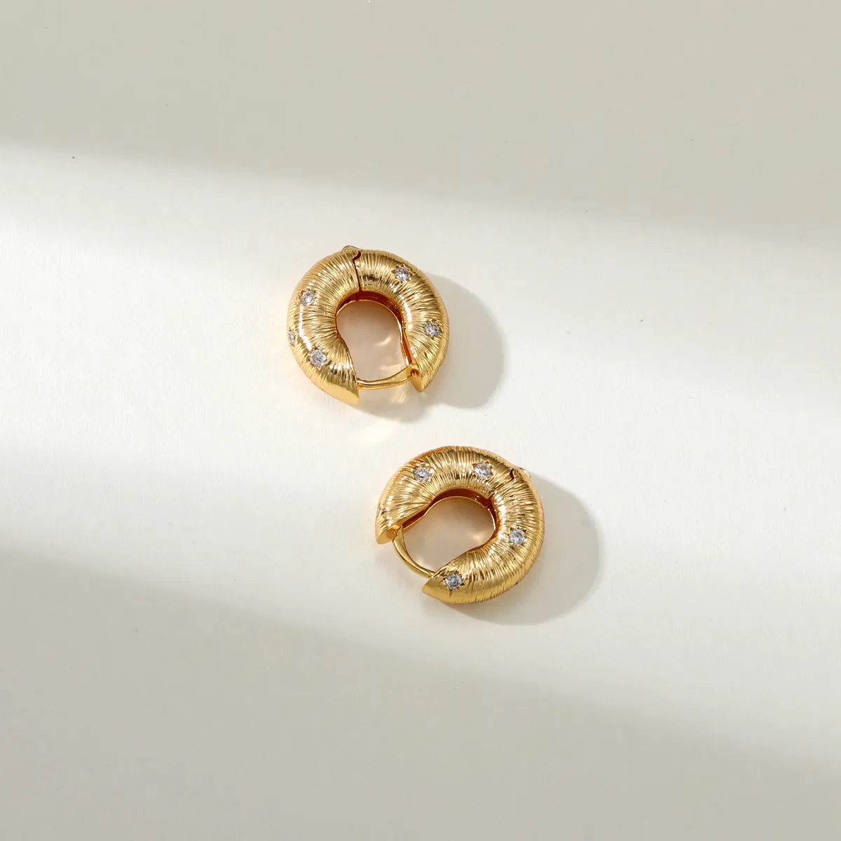 Textured Round Huggie Earrings — view 1
