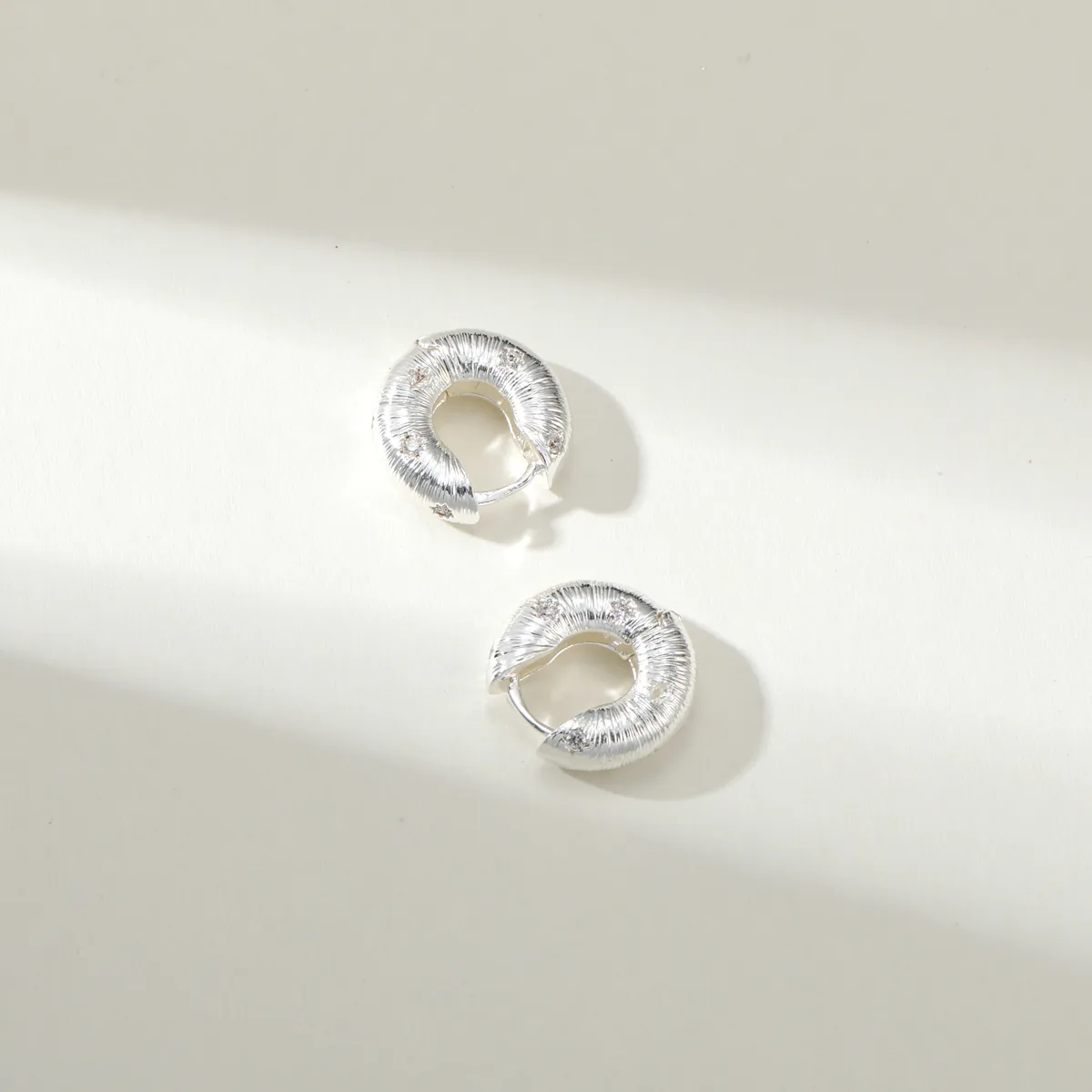 Textured Round Huggie Earrings — view 1