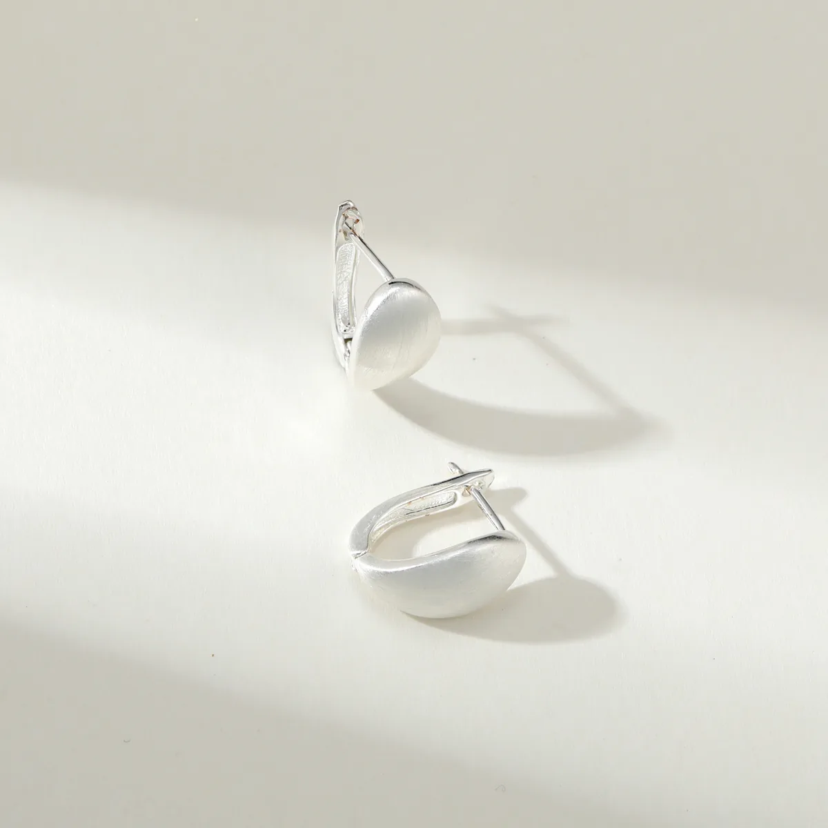 Sculpted Disc Hoop Earrings — view 1